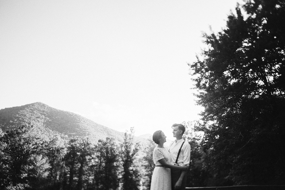 married couple in front of mountain backdrop at brahma ridge