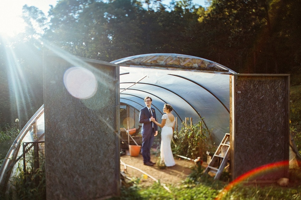 wedding couple in greenhouse at brahma ridge event center