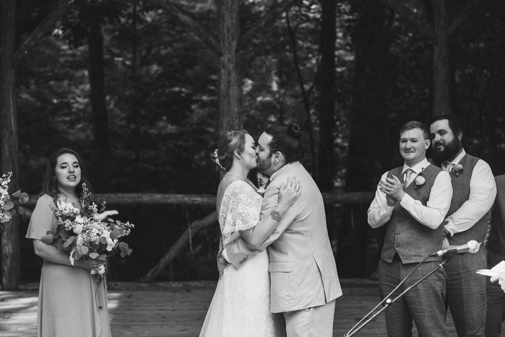 bride and groom kissing at the end of the ceremony