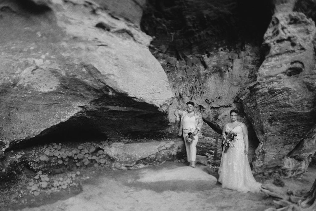 queer wedding portrait black and white with rock formations