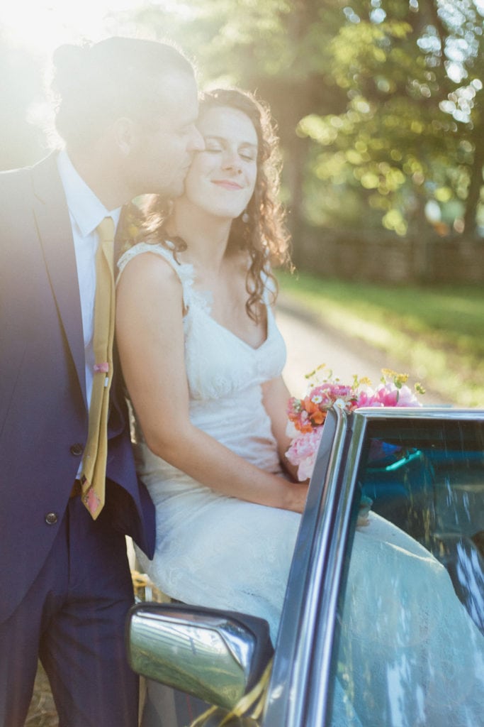 wedding portrait with classic car